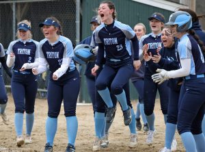 Triton players await the arrival of home-run hitter Haleigh Harris