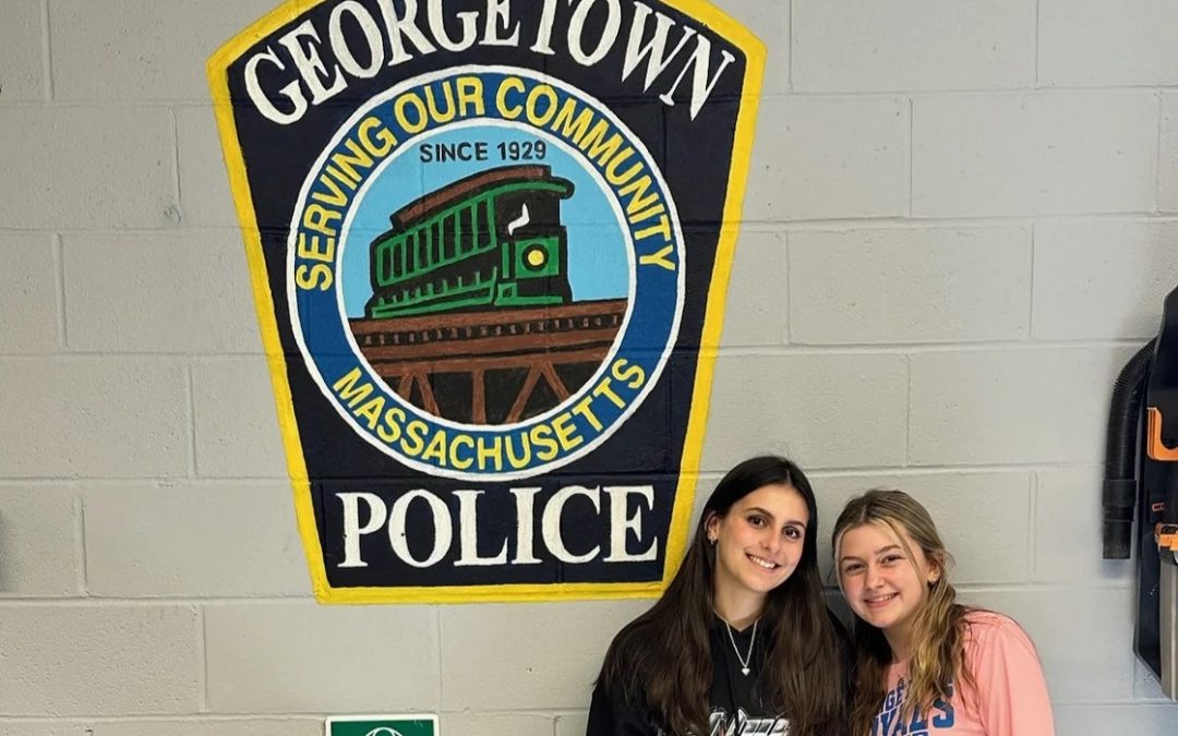 Georgetown Police Repaint Station Garage with Help from Middle High School Seniors