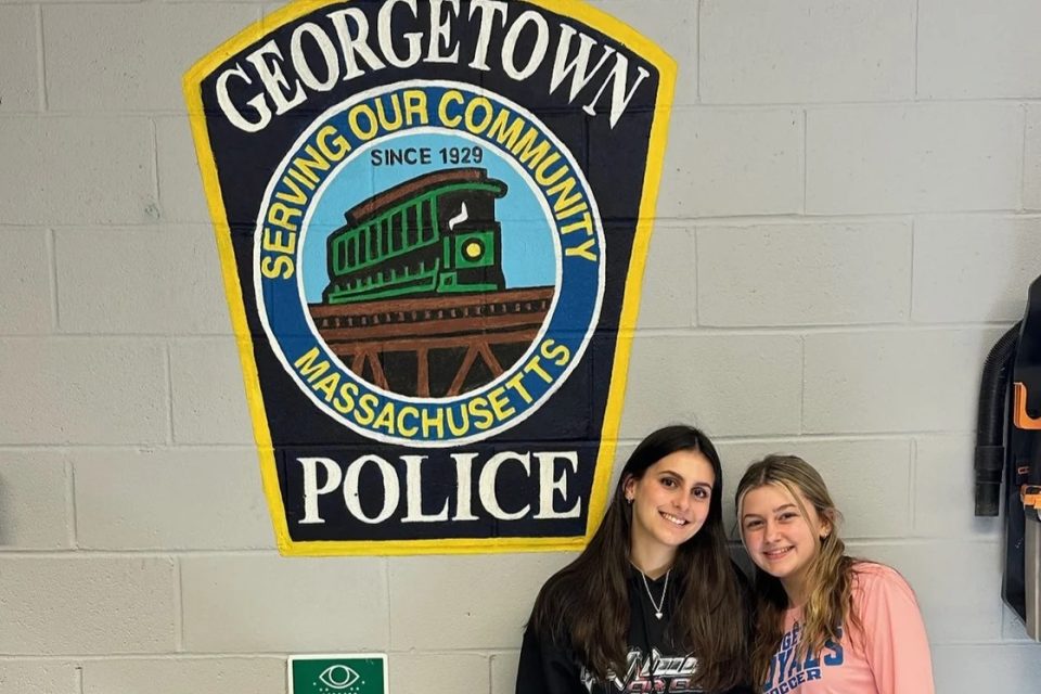 Georgetown Police Repaint Station Garage with Help from Middle High School Seniors